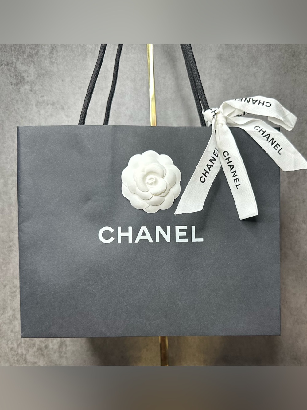 CHANEL Black Shopping Bag with 3D Camellia Flower & Ribbon